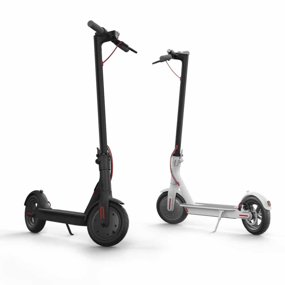 The #1 Smart Folding Electric Scooter for Adults in Black & White - 8.5 The #1 Smart Folding Electric Scooter for Adults in Black & White - 8.5